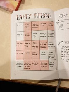 an open notebook with the words happy bingo written on it