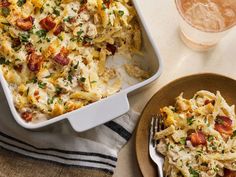 a casserole dish with chicken, bacon and parmesan cheese