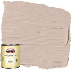 a paint can with the lid open and it's light beige color on top