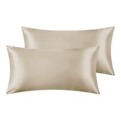 two pillow cases with satin sheets on them, one is white and the other is beige