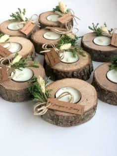 small wooden slices with candles tied to them