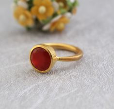 Description Natural Carnelian Ring - December Birthstone ✦Gemstone: Genuine Carnelian ✦Stone Cut: Round✦Band Size: 3 mm✦Metal: 925 Sterling Silver Natural stones may vary slightly in shape, size and color.Handmade ItemYou will receive the same piece as in the picture or identical. Since all gemstones are different from each other, I cannot guarantee that the gemstone you see above will still be available.. But I assure you will get same quality piece as shown in the above picture.# Your order will be dispatch within 3-5 working days after receiving order# Items will be sent via registered airmail and take approx. 15-20 days to arrive. # Express mail Via FedEx/DHL/Aramex, is available for an extra charge at checkout. Carnelian Rings With Natural Stones, Carnelian Natural Stones Round Ring, Orange Ruby Gemstone Ring For Gift, Red Moonstone Gemstone Ring As Gift, Red Moonstone Gemstone Ring For A Gift, Carnelian Amber Gemstone Rings, Amber Carnelian Gemstone Rings, Jewlery Rings, Silver Jewlery