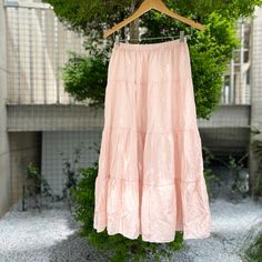 💃 The skirt comes with an elastic waistband and is standardly designed to fit waist from 24 to 36 inches. For alternative sizing, please contact us to arrange a custom fit. ✨Hey fashionistas, get ready to dance into the new season with our pink skirt! 🌸💃 This women's spring and autumn must-have is a high-waist big swing skirt that's perfect for adding a pop of color and a whirl of style to your wardrobe. Our A-line, long, and cake skirt design is not just a skirt; it's a fairy skirt that's lined for comfort and ready to make every day feel like a celebration. Plus, it's the perfect gift for the girl who loves to twirl. So go ahead, add a touch of sweetness and elegance to your look and make every step a runway walk! 👗 Solid Color Tiered Gathered Mini Skirt, Tiered Mini Skirt With Elastic Waistband, Flowy Tiered Skirt With Elastic Waistband, Spring Maxi Skirt With Gathered Detail, Voluminous Solid Skirt For Summer, Solid Voluminous Skirt For Summer, Solid Color Voluminous Summer Skirt, Voluminous Solid Color Summer Skirt, Spring Long Skirt With Elastic Waistband