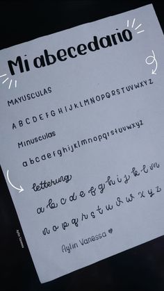 a close up of a piece of paper with writing on it that says mi abecedanoo