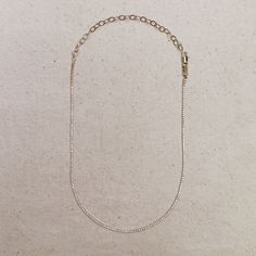 Adorn your neck with this stunning 18k Gold-filled Tennis necklace. Delicate and minimalist, its classic look is sure to make a statement. Our 1.2mm Cubic Zirconia stones shine brightly, making this the perfect accessory for any outfit. Metal: 18k Gold Filled High-quality AAAAA Cubic Zirconia Material: 1.2mm micro CZ chain Size: 12 inches long + 4 inches extender chain Hypoallergenic Water-resistant Handcrafted in Brazil Also available our matching Tennis Bracelet to complete your outfit. Spear Earrings, Horn Pendant, Cz Necklace, Tennis Necklace, Tennis Bracelet, Charm Earrings, Stone Rings, Necklace Etsy, Gold Filled