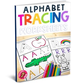 the book cover for alphabet tracing worksheets with crayons and pencils