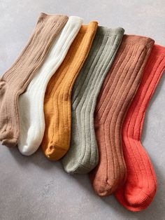 Li Puna Seamless Baby Knee Socks Our ribbed baby socks are produced in 2 different sizes as 0-2 yearsand 3-4 years. The toe tips of the socks are seamless. In our six-pack sock set; Tere are ecru, mustard, mink, brown, khaki and brick colored socks. 90% Cotton - 10% Lycra If you like our socks check out our store to visit other products.  We're working hard every day to adding new products so come back often!  If you have any questions, don't hesitate to ask! Baby Knee Socks, Sock Set, Brick Colors, Baby In Pumpkin, Colorful Socks, Knee Socks, Baby Socks, Kids Socks, Cotton Socks