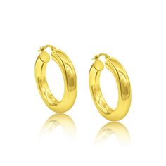 Jo Nayor's 14K Gold Dahlia Hoops are perfect for any occasion. Crafted from pure 14K gold, these hollow hoop earrings are available in four sizes - 45mm, 30mm, 27mm and 35mm. Each hoop is 5mm thick, offering a beautiful contrast and timeless elegance. Perfect for everyday wear or special occasions, these 14K gold hoops will stylish for years to come. Sold as a pair only *diameters are approximate, 45mm & 25mm have an omega clasps 14k Gold Hoop Earrings, Diamond Tennis Necklace, Toggle Necklace, Gold Baby, Diamond Star, Tennis Necklace, Affordable Luxury, Gold Hoops, Link Necklace