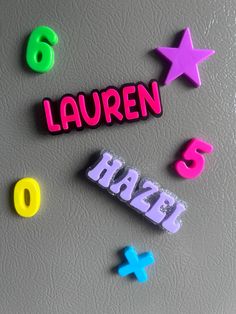 the name lauren is spelled with magnets to spell out her name