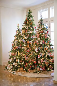 a christmas tree with presents on it and the words decorate your christmas tree with special themes