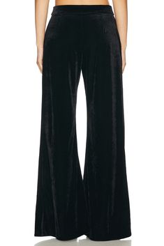 Self: 96% polyester 4% elastane, Lining: 95% polyester 5% elastane.  Made in Brazil.  Hand wash.  Hidden front zipper closure.  Side slant pockets.  Wide leg design.  Velvet fabric.  .  .  .  .  .  .  .  .  . Velvet Wide Leg Pants, Luxury Velvet Wide Leg Pants Elegant, Fitted Velvet Wide Leg Pants, Velvet Wide-leg Party Pants, Luxury Velvet Wide-leg Pants, Purple Lilac, Tailored Trousers, Front Zipper, Velvet Fabric