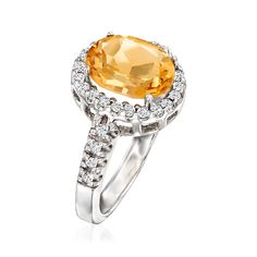 Ross-Simons - 2.50ct Citrine, .30ct t. w. Diamond Ring Oval Cut in 14kt White Gold. Size 5. Take this gorgeous ring as a sign to introduce your wardrobe to a new hue! Exuding a warm shade of marmalade orange, the design showcases a 2.50 carat oval cushion-cut citrine inside a luminous halo of .30 ct. t. w. round brilliant-cut diamonds, which cascade onto the 14kt white gold band. 1/2" wide. Diamond and citrine ring. Citrine birthstones are the perfect gift for November birthdays. Diamond Ring Oval, Citrine Birthstone, November Birthday, Gorgeous Ring, Citrine Ring, Ring Oval, White Gold Band, Gold Band, Round Brilliant Cut Diamond