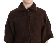 Indulge in the epitome of luxury with this exquisite Class Roberto Cavalli brown cardigan. Expertly crafted from a plush blend of virgin wool, mohair, nylon, and a hint of elastane, this piece guarantees both comfort and style. Featuring short sleeves and a chic button closure, it is the perfect addition to your elegant wardrobe. Complete with the iconic logo detail and accompanied by the original tags and store bag, it’s a wardrobe essential that exudes sophistication. Material: 38% Virgin Wool Luxury Brown Button-up Cardigan, Luxury Brown Cardigan With Buttons, Luxury Brown Cardigan With Button Closure, Luxury Brown Mohair Cardigan, Mens Lightweight Jacket, Men Parka, Dressy Sandals, Mohair Knit, Brown Cardigan