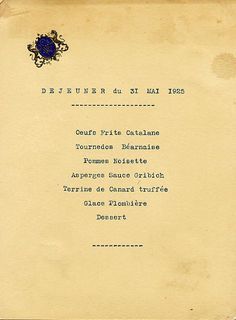 an old fashioned menu is shown in black and blue ink on parchment paper with writing