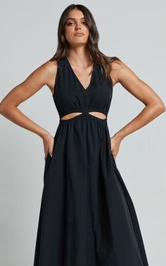 Get ready to turn heads in the Celiana Midi Dress. This stunning black A Line dress features a flattering plunge neckline and cut-out details, giving it a touch of sassiness. Made from soft and breathable poplin cotton, this sleeveless midi dress is perfect for both casual outings and special occasions. The elastic waist adds definition to your figure while providing all-day comfort. Embrace your inner fashionista with this empowering piece that effortlessly combines style and versatility. Produ Cheap Black Midi Sundress, Black Linen Dress Target, Cheap Trendy Black Midi Dress, Affordable Sleeveless Black Maxi Dress, Waist Definition Dress, Plunge Dress Midi, Affordable Black Midi Sundress, Cheap Black Midi Dress For Summer, Midi Plunge Dress