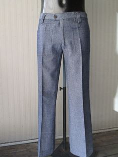 Vtg 60s wool denim bellbottom pants. Low waist and belt loops (pics 2-4). Two front patch pockets. Mint conditions. They fit size M about 32-33 US Measurements: (lay flat and double waist, hips and thigh) pls.check the rise in order to calculate the waistline Waist 32.3" hips 41.7" rise 9.8" thigh circumference 23.6" inseam 30" bottom width 11" X 2 Misure: Vita 82 cms fianchi 106 cms cavallo 25 cms coscia 60 cms lungh.int.gamba 76 cms ampiezza fondo 28 cms X 2 In  order to avoid any unpleasant m Retro Denim Blue Bottoms With Pockets, Retro Wide-leg Bottoms With Patch Pockets, Retro Wide Leg Bottoms With Patch Pockets, Retro Wide Leg Bottoms With Hip Pockets, Vintage Wide Leg Jeans With Pockets, Classic Flare Pants With Pockets, Fitted Retro Jeans, Retro Fitted Jeans, Retro Straight Leg Bottoms With Patch Pockets