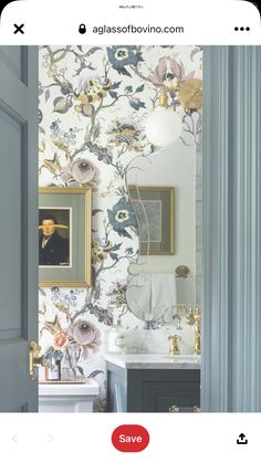 the bathroom is decorated with floral wallpaper