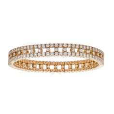 This gorgeous diamond bracelet is part of ZYDO's signature Stretch Collection and boasts a total of 6.82 carats of top quality F color and VS clarity diamonds. The bracelet is mounted on 18k rose gold and holds a double row of continuous round diamonds all around, with several round shape diamonds in between the two rows. Handcrafted in Italy by ZYDO.Gem: White DiamondsQuality: Clarity: VS, Color: FTotal Diamond Carat Weight: 6.82 caratsDimension: Length: 6.75 inches Gold Stretch Bracelet, Diamond Carat, Stretch Bracelet, 18k Rose Gold, Stretch Bracelets, Round Shape, Diamond Bracelet, Round Diamonds, Two By Two