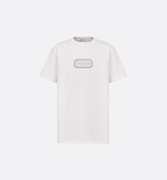 The T-shirt is a relaxed and modern piece. Crafted in white cotton jersey, it features a Christian Dior Couture signature in a contrasting embroidered frame on the chest. Thanks to its relaxed fit and ribbed crew neck with V-neck topstitching, the T-shirt will pair effortlessly with any jeans for a contemporary look.. L Versace Pants, Givenchy Jacket, Denim Swimsuit, Versace Jacket, Givenchy Tshirt, Louboutin Bags, Off White Jacket, Burberry T Shirt, Dior Star