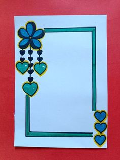 a piece of paper with hearts and flowers on it