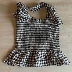 Never Worn Black And White Checkered Tie Sleeveless Top, Shein, Size Small! Black Ruffled Tank Top For Summer, Sleeveless Gingham Tops For Summer, Gingham Cotton Tank Top For Summer, Sleeveless Gingham Tank Top For Spring, Summer Cotton Gingham Tank Top, Casual Summer Gingham Tank Top, Casual Gingham Tank Top For Spring, Casual Gingham Tank Top For Summer, Cotton Gingham Tank Top For Summer