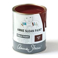 a can of annie sloan paint with red and white colors on the bottom, it's dark brown