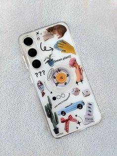 a cell phone case with various stickers on the back and sides, including an assortment of different items