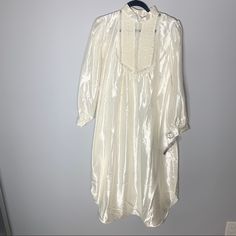 Nwt Shoulder To Hem - 45 Inches Don’t Like The Price But Love The Item? Submit An Offer! No Try Ons Or Trades. Please Check Out The Rest Of My Closet! Feminine Cream Sleepwear For Bedtime, Elegant Long Sleeve Cream Sleepwear, Feminine Cream Bedtime Dress, Elegant Cream Nightgown For Sleep, Elegant White Nightgown For Sleepover, Vintage Cream Nightgown For Bedtime, Cream Vintage Nightgown For Bedtime, Elegant Cream Nightgown For Spring, Vintage Cream Nightgown For Loungewear