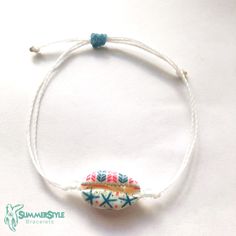 This item is ready to ship! Customization is NOT available for this listing. If you would like something custom, please send me a message! These cowrie shell wax cord bracelets are the perfect gift for the summer lover in your life! They're the cutest summer accessory! Completely waterproof, adjustable so it will fit any size wrist. Just pull to close. All of my friendship bracelets are made with 100% cotton embroidery floss & my water proof jewelry is made with 100% waxed polyester cord. An White Beachy Friendship Bracelets For Vacation, Beachy White Friendship Bracelets For Vacation, Adjustable Tropical Bracelets For Beach, White Beach Bracelets For Beach Season, White Bracelets For Beach Season, White Friendship Bracelets For Beach, Adjustable Turquoise Bracelets For Summer, Adjustable Turquoise Bracelet For Summer, Adjustable Summer Beaded Bracelets For Beach