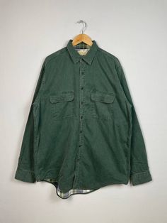 "*ITEM: Vintage 90s L.L Bean Chore Workwear Jacket Green Outerwear Mens Large 1990s L.L Bean Usa Hunting Jacket Workers Windbreaker Jacket Size L *ITEM DETAILS: 👇🏻 Please be aware that all vintage items will usually show a few signs of wear or fading due to age, but anything visible such as stains or holes, and serious flaws have been photographed.For any further information on this item please contact us and we will be happy to help. *SIZE: LARGE *ACTUAL SIZE MEASUREMENT: 👇🏻 *PIT TO PIT(WID Retro Long Sleeve Utility Jacket For Outdoor, Retro Green Utility Jacket For Winter, 90s Style Green Outerwear With Pockets, Vintage Cotton Shacket With Long Sleeves, Retro Cotton Utility Jacket With Long Sleeves, 90s Style Oversized Cotton Outerwear, 90s Cotton Outerwear For Fall, 90s Style Cotton Outerwear For Fall, 90s Style Long Sleeve Outdoor Outerwear