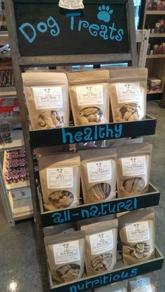 dog treats displayed on shelves in a pet store