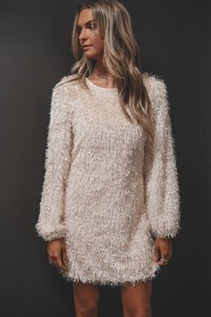 This outfit? No question about it bestie you are here to slay!! Fuzzy long sleeve cream dress, loose fit, button closure behind the neck, dress is lined Material is Polyester Hang to dry Model is 5'7 wearing a small Cozy Long Sleeve Cream Dress, Cream Knit Long Sleeve Dress, Beige Lace Long Sleeve Mini Dress, Cream Long Sleeve Knit Sweater Dress, Here To Slay, Wedding Guest Romper, Beige Textured Knit Long Sleeve Sweater Dress, Party Bottoms, Dress Loose Fit