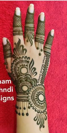 a hand with hendi designs on it and the words, how to draw hendi designs