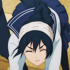 an anime character with black hair holding her head above her head and looking at the camera