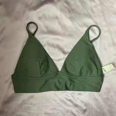 Super Cute, Brand New Bikini Top In Olive Green Color (Bottom Sold Separately). No Underwire. Bra Pads Are Removable. Wrong Size For Me, And I Missed The Return Deadline. Green Triangle Top With Padded Cups, Green Triangle Top Swimwear With Built-in Bra, Green Swimsuit Bikinis, Aerie Swim, Green Swimsuit, Bra Pads, Green Olive, Olive Green Color, Cheeky Bikinis