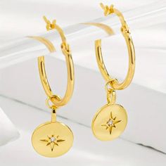 Star Dangle Earring striling silver 925 Gold plated Earring setting use White zercon setted earring support for ear handmade Bali. Handmade Earring and hook earring support Finding  Star Dangle Earring is an exquisite piece crafted from high-quality Sterling Silver 925, elegantly plated with gold to add a touch of sophistication. These earrings feature a captivating design with three delicate stars gracefully dangling from the ear, creating a sense of celestial charm. Each star is adorned with s Elegant Dangle Hoop Earrings With Star Charm, Elegant Star Shaped Hoop Earrings Gift, Elegant Round Earrings With Star Charm, Silver Star-shaped Gold Plated Earrings, Cubic Zirconia Drop Earrings With Star Charm, Tarnish Resistant Star Earrings, Elegant Round Hoop Earrings With Star Charm, Silver Tarnish Resistant Earrings As Gift For Her, Silver Tarnish Resistant Earrings For Her