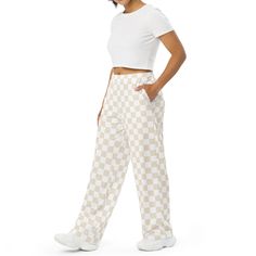 These wide-leg pants have an adjustable waist and are made with soft, stretchy fabric.  * Relaxed unisex fit * Practical side pockets * Elastic waistband with a white drawstring * Can be worn on the waist or on the hips * Premium knit mid-weight jersey fabric * 95% polyester, 5% elastane * Fabric weight: 6.19 oz/yd *item designed by me & printed by Printful Casual White Bottoms With Loosely Fitted Hips, Trendy White Pants With Side Pockets, Trendy White Full Length Cargo Pants, Casual White Parachute Pants, White Summer Sweatpants With Pockets, Sporty White Parachute Pants For Loungewear, Casual White Pants With Side Pockets, Casual White Straight Leg Pants, White Sporty Parachute Pants For Loungewear