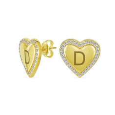 These stunning heart stud earrings symbolize love, crafted from 14k yellow gold plated for elegance. Modern heart shape design. Secure back post for comfortable wear. Perfect gold heart stud earrings gift. Carat Size Chart, Gold Heart Stud Earrings, Heart Shape Design, Initial Earrings Studs, Gold Heart Studs, Engraved Earrings, Modern Heart, School Jewelry, Heart Shaped Jewelry