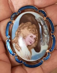 A signed Thomas Mott ( L.Mott ) enamel porcelain pendant convertible brooch necklace.  The chain is 10 inch drop...see pictures. The chain is gold plated on silver. The pendant is framed in a blue enameled frames scroll border with the porcelain cameo in domed form with a handpainted portrait of the Duchess in regency profile. The back is gold plated and the brooch part has a good unused pin, and signature TLM for Thomas Mott with made in England. About us: I deal in antiques and collectibles, m Victorian Style Enamel Pin Gift, Victorian Enamel Brooches For Formal Wear, Victorian Enamel Brooches For Formal Occasions, Victorian Style Enamel Brooches For Formal Occasions, Elegant Enamel Cameo Jewelry, Artistic Enamel Jewelry For Formal Occasions, Victorian Enamel Pin Collectible, Victorian Enamel Collectible Pin, Artistic Formal Brooch Jewelry