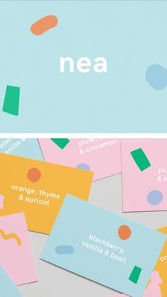 some business cards are laying on top of each other with the word nea printed on them