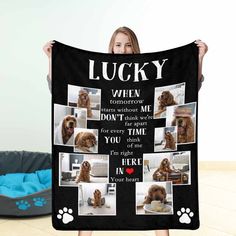 a woman is holding up a blanket with pictures of her dog's family and their names