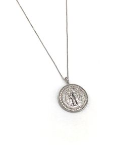 Saint Benedict Medallion Necklace Product Specifications: - Yellow Gold Filled 18K - White Sterling Silver .925 -17-20” Length - .75” Drop Pendant Diamond Necklace With Coin Pendant As Gift, White Gold Round Medallion Necklace, Tarnish Resistant, Gift Diamond Necklace With Coin Pendant, Round Diamond Necklace With Coin Pendant As Gift, Spiritual Round Box Chain Necklace, Silver Tarnish Resistant Round Pendant Charm, Sterling Silver Medallion Necklace With Box Chain, Silver Custom Necklace With Tarnish Resistant Round Pendant, Spiritual White Gold Necklaces With 17 Jewels