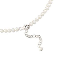 Ross-Simons - 5-11.5mm Graduated Cultured Pearl Necklace, .24ct t. w. Diamonds, Silver. 16". The classic pearl necklace ? now dressed with diamonds! Lustrous 5-11.5mm cultured oval freshwater pearls combine with nearly a quarter carat diamond rondelles for an exceptionally elegant look. The exquisite strand graduates to a single impressive 11.5mm pearl. This necklace, exclusively ours, evokes a classic feel with a hint of drama. Graduates from 3/16" to 3/8" wide. Diamonds total .24 carats. Inclu Elegant Sterling Silver Pearl Necklace With Round Beads, Classic Pearl Necklace With Diamond Accents For Anniversary, Elegant Oval Pearl Necklaces, Elegant Oval Pearl Necklace, Pearl White Pearl Necklace With Diamond Accents, Classic Oval Pearl Charm Jewelry, Elegant Oval Jewelry With Sterling Silver Clasp, Classic Pearl Charm Jewelry For Anniversary, Oval Akoya Pearl Jewelry In Pearl White