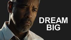 a man in a white shirt and tie with the words dream big