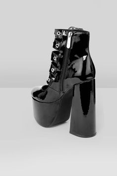 PANIC.- Statement platform heels.- Patent faux leather.- Statement, adjustable pentagram buckles.- Inside zip closure.- Heel height 16cm/6.2".- Platform height 7.5cm/2.9".With KILLSTAR branding, 100% PU. Trendy High Heel Shoes, Gothic High Heel Platform Boots For Club, Trendy High Heels For Alternative Fashion, Trendy High Heel Shoes For Alternative Fashion, Trendy High Heel Heels For Alternative Fashion, Edgy High-top Platform Boots For Party, Edgy Polyurethane Platform Boots For Party, Punk Style High Heel Platform Boots, Party High Cut Chunky Platform Boots