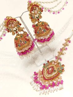 Nauratan Multi Stone Earrings Tikka set/ Pakistani Jewelry/Pakistani wedding jewelry Pakistani Wedding Jewelry, Jewelry Pakistani, Pakistani Jewelry, Jewellery Sets, Wedding Jewellery, Pakistani Wedding, Wedding Jewelry Sets, Multi Stone, Stone Earrings