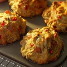 several muffins sitting on top of a baking pan