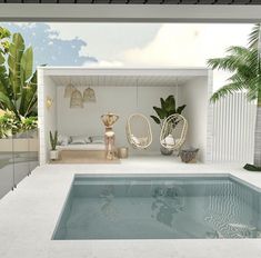 an indoor swimming pool surrounded by palm trees and hanging hammocks in the sun