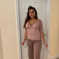 2pc Set Includes Top With V-Neck And Wide Leg Trouser. The Model Is 5/6inches. V-neck Sets For Night Out In Spring, Spring Season V-neck Sets For Night Out, Spring V-neck Sets For Night Out, Fitted V-neck Sets, Stretch V-neck Sets For Workwear, Stretch V-neck Workwear Sets, Pink V-neck Set For Work, Pink V-neck Workwear Set, Elegant V-neck Stretch Sets