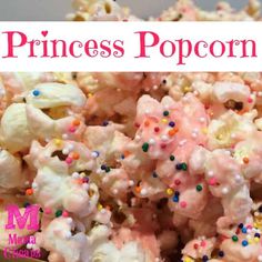 a pile of popcorn with sprinkles on top and the words princess popcorn above it